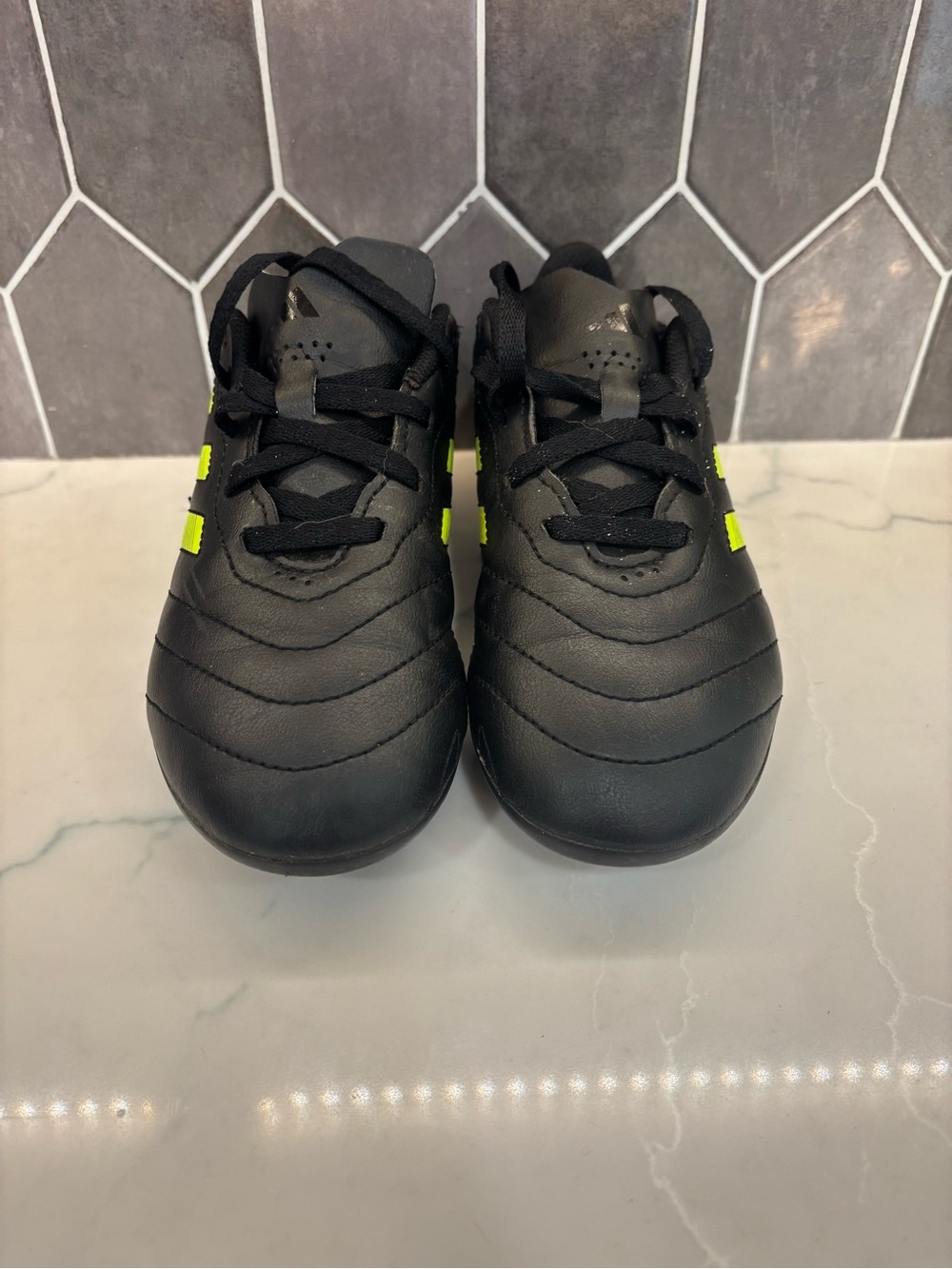 Kids Black Adidas Soccer Cleats with Neon Yellow Accents